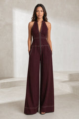 Black sleeveless high-neck jumpsuit