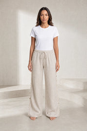 Pantalon large beige à coquillages | Lounelle Paris