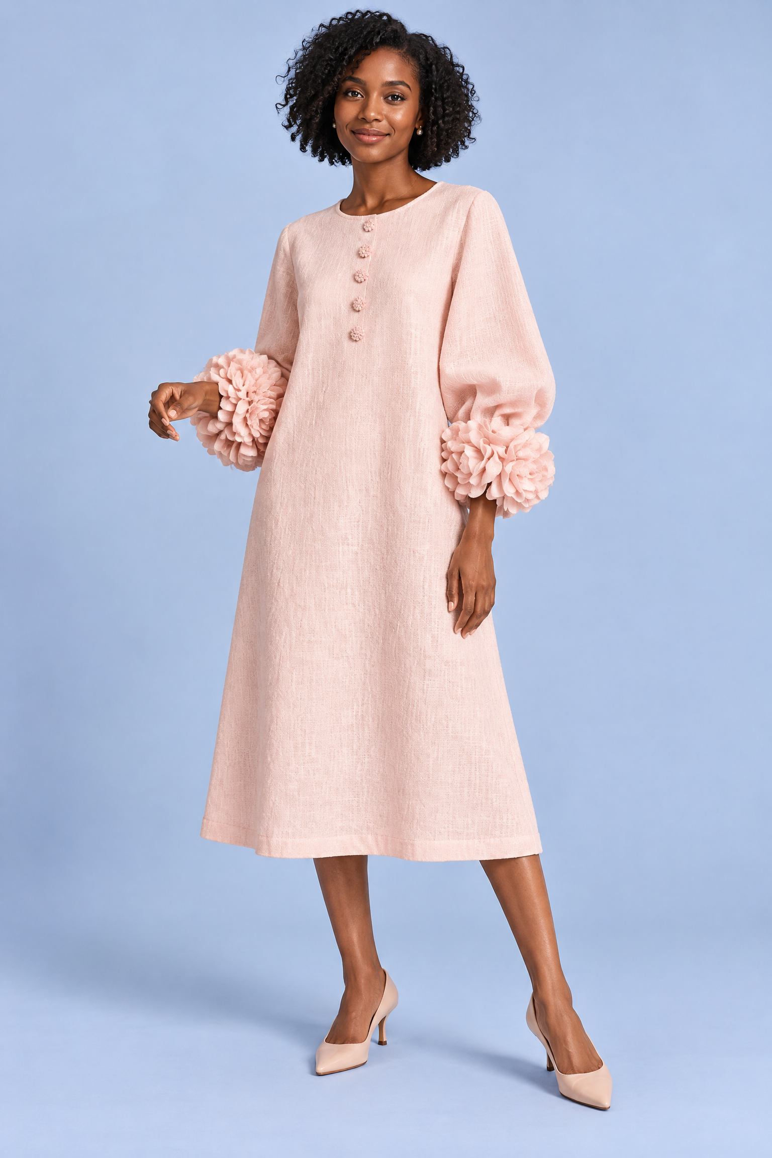 Robe midi rose coupe trapèze à manches bouffantes | Vue de face | Lounelle Paris