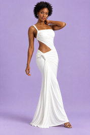 Robe longue blanche asymétrique à jupe portefeuille | Vue en mouvement | Lounelle Paris