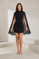 Robe noire col montant manches cape